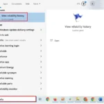 Mở Reliability Monitor qua thanh tìm kiếm Start trên Windows.