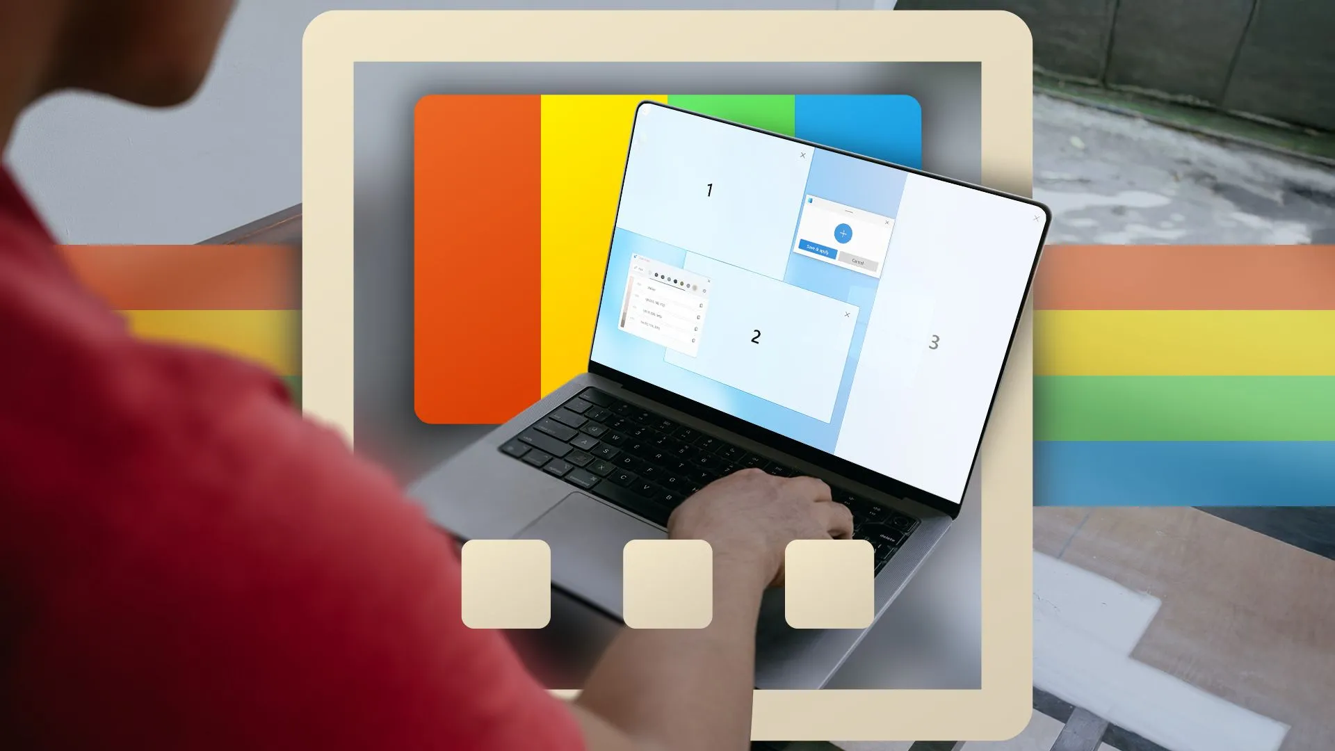 Một người đàn ông làm việc trên laptop với tính năng FancyZones của PowerToys được làm nổi bật