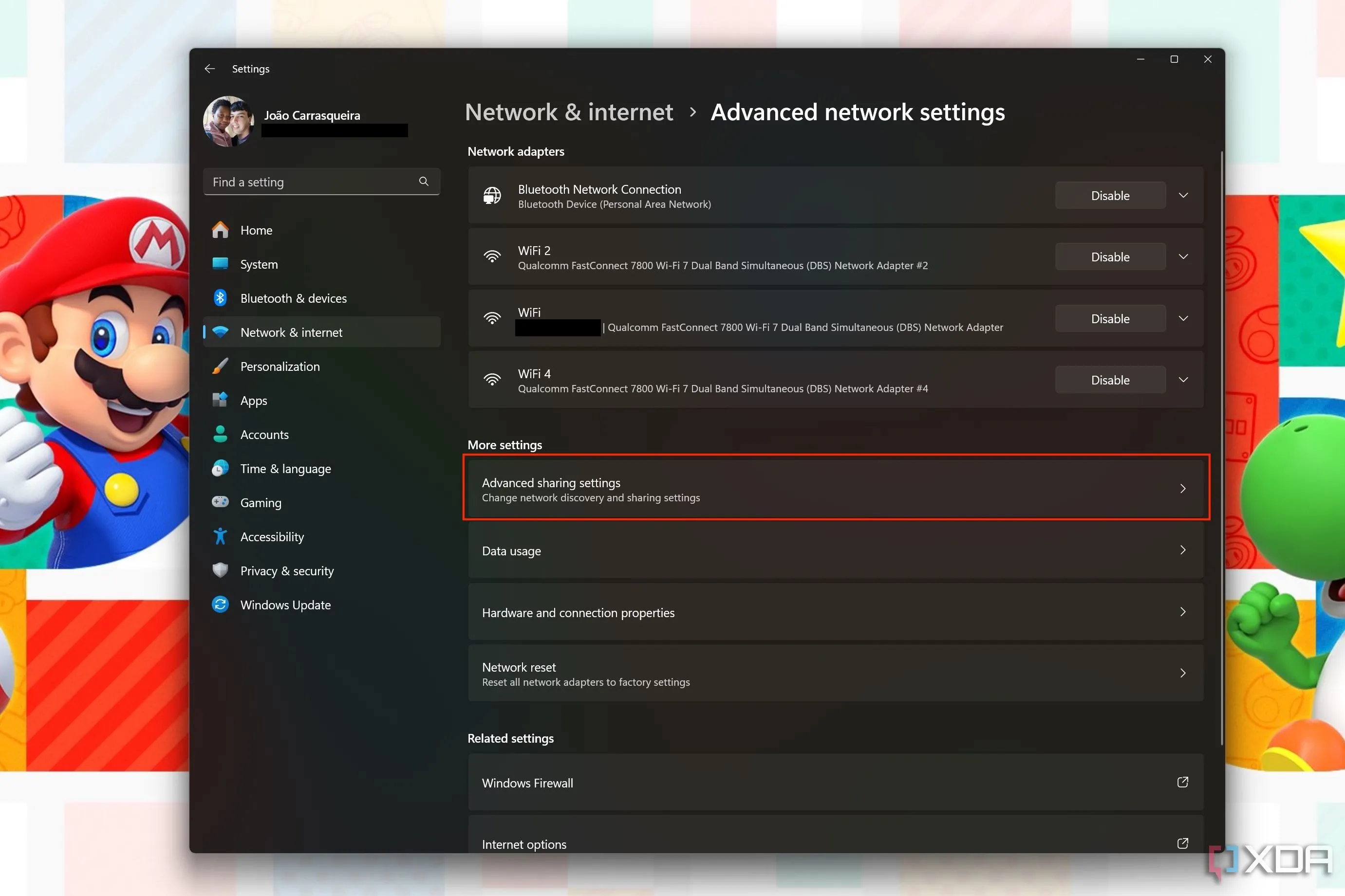 Cài đặt Advanced network settings trong Windows 11, với nút Advanced sharing settings được làm nổi bật