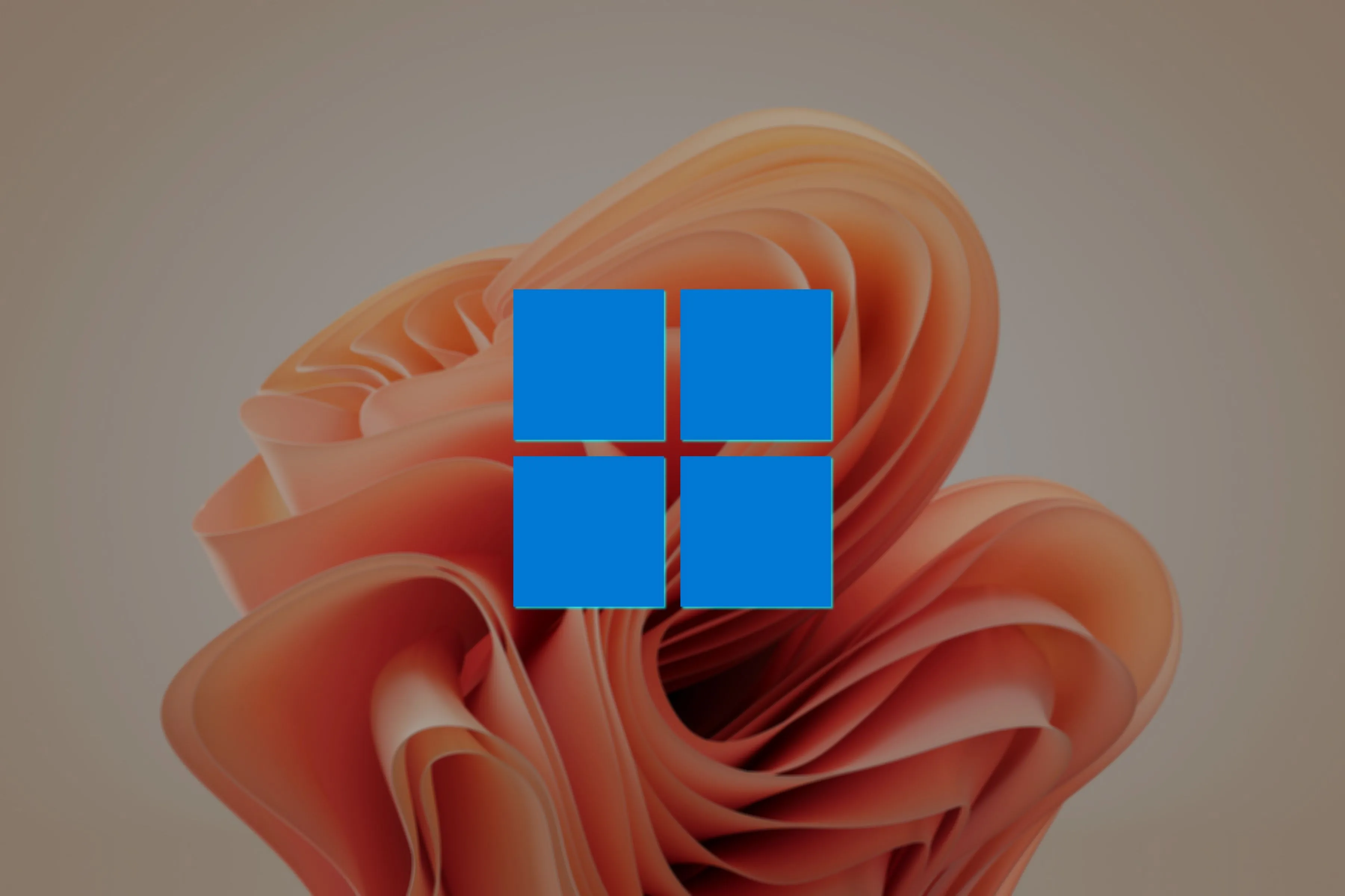 Logo Windows 11 nổi bật trên nền đá sa thạch, biểu trưng cho việc lựa chọn phiên bản Windows phù hợp và quản lý bản quyền khi tạo ISO.
