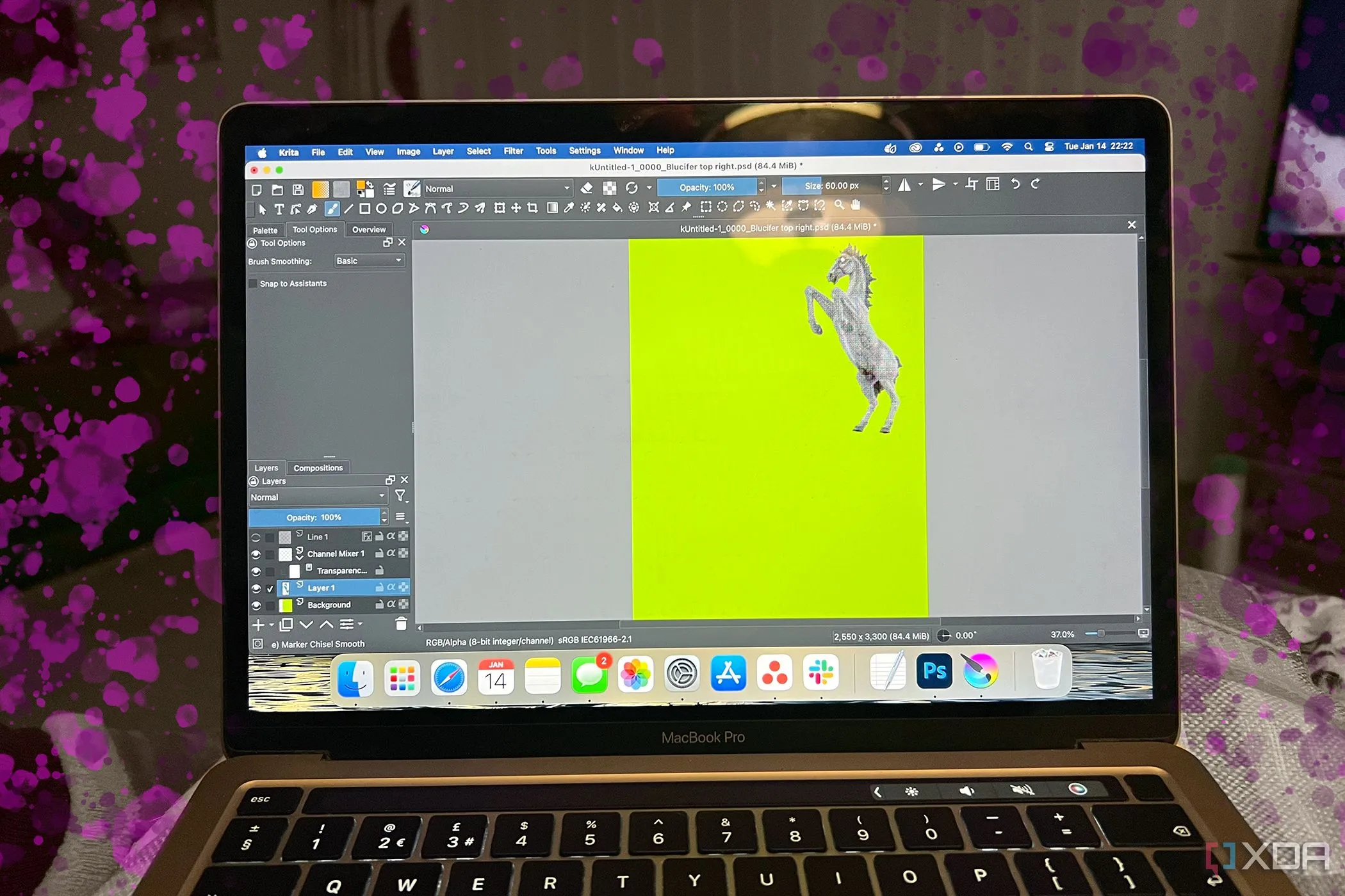 Màn hình MacBook hiển thị Krita với các hiệu ứng màu hồng vây quanh