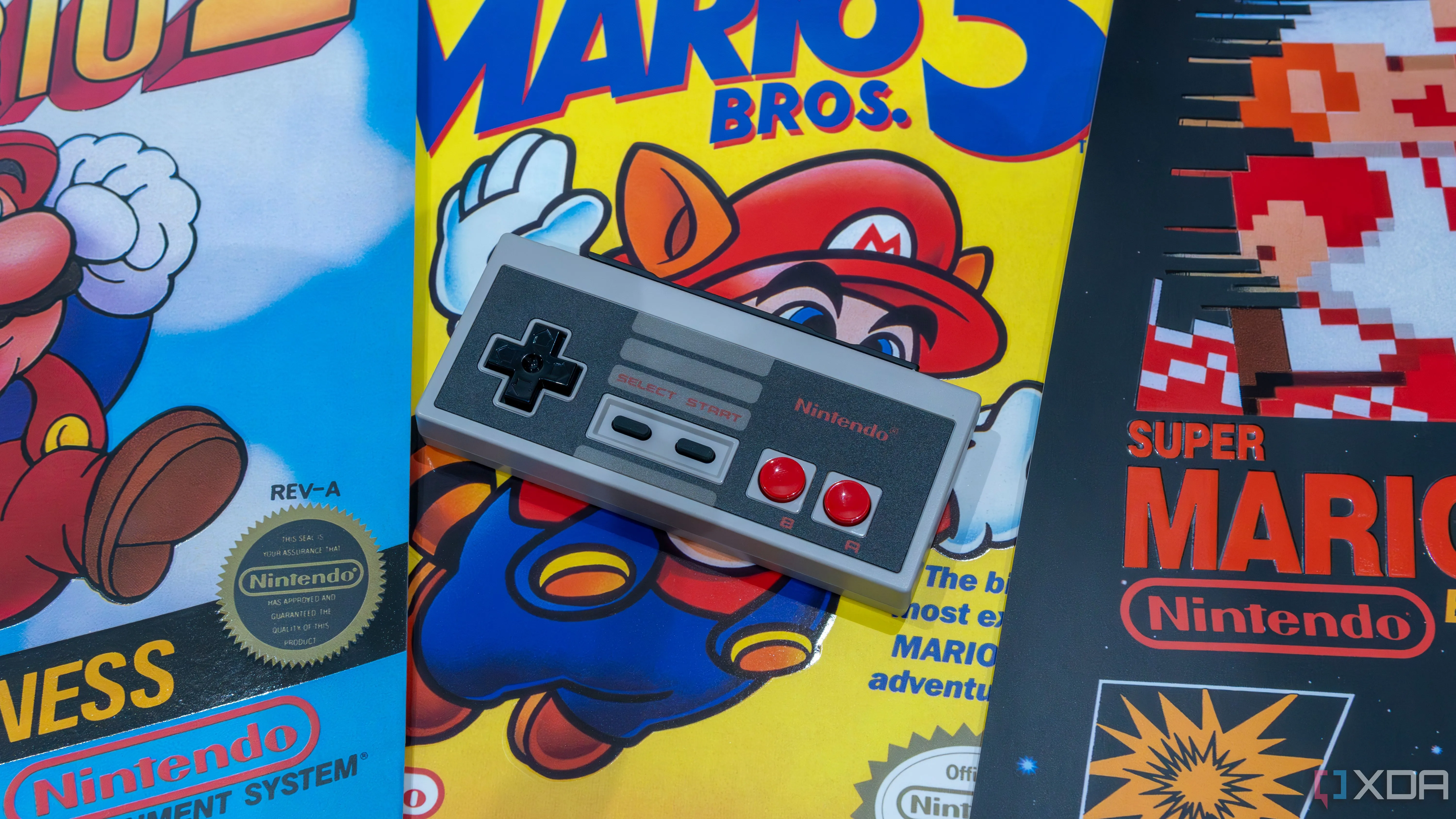 Tay cầm NES bản replica trên các poster game Mario