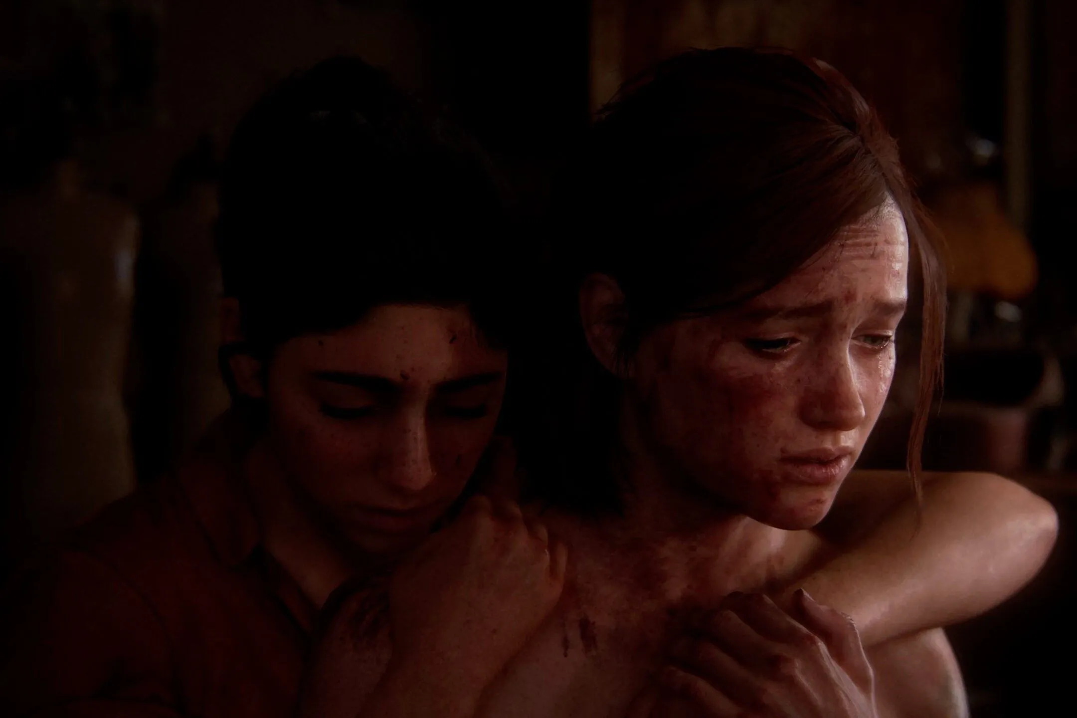 Ellie và Dina ôm nhau, khoảnh khắc thân mật giữa hai nhân vật trong game The Last of Us Part II.