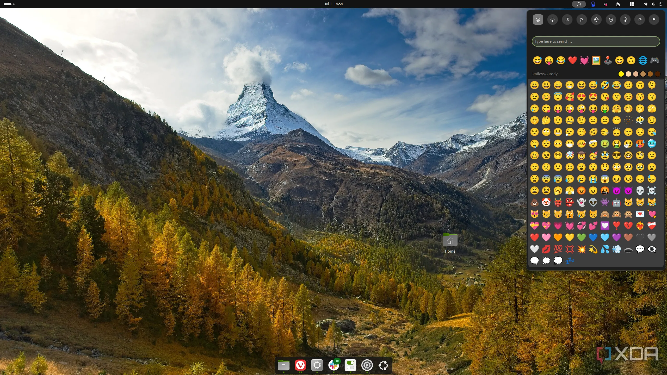 Giao diện Ubuntu hiển thị bảng biểu tượng cảm xúc được cung cấp bởi tiện ích mở rộng Emoji Copy