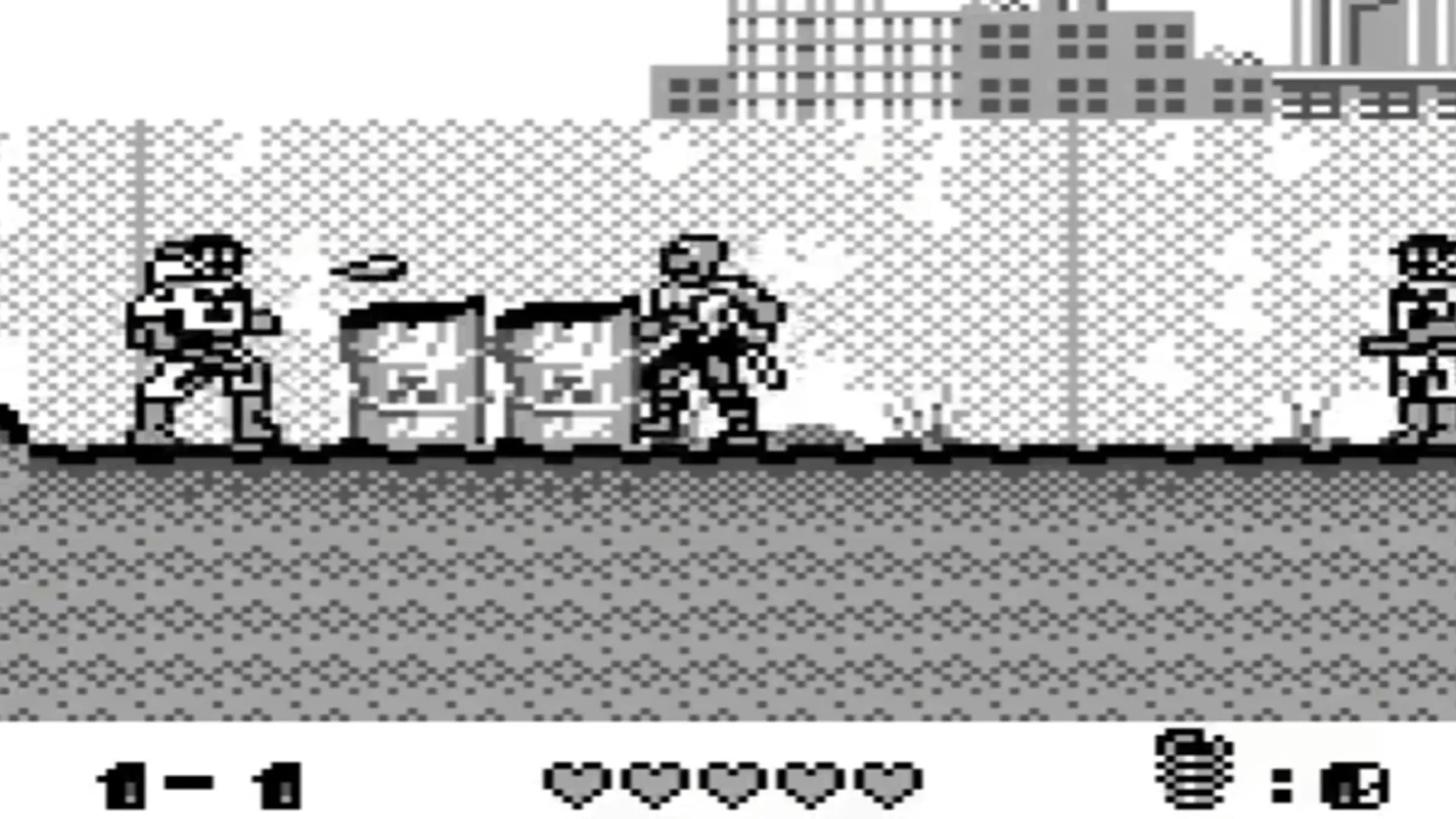 Hình ảnh gameplay của Toxic Crusaders trên Game Boy với nhân vật Toxie chiến đấu