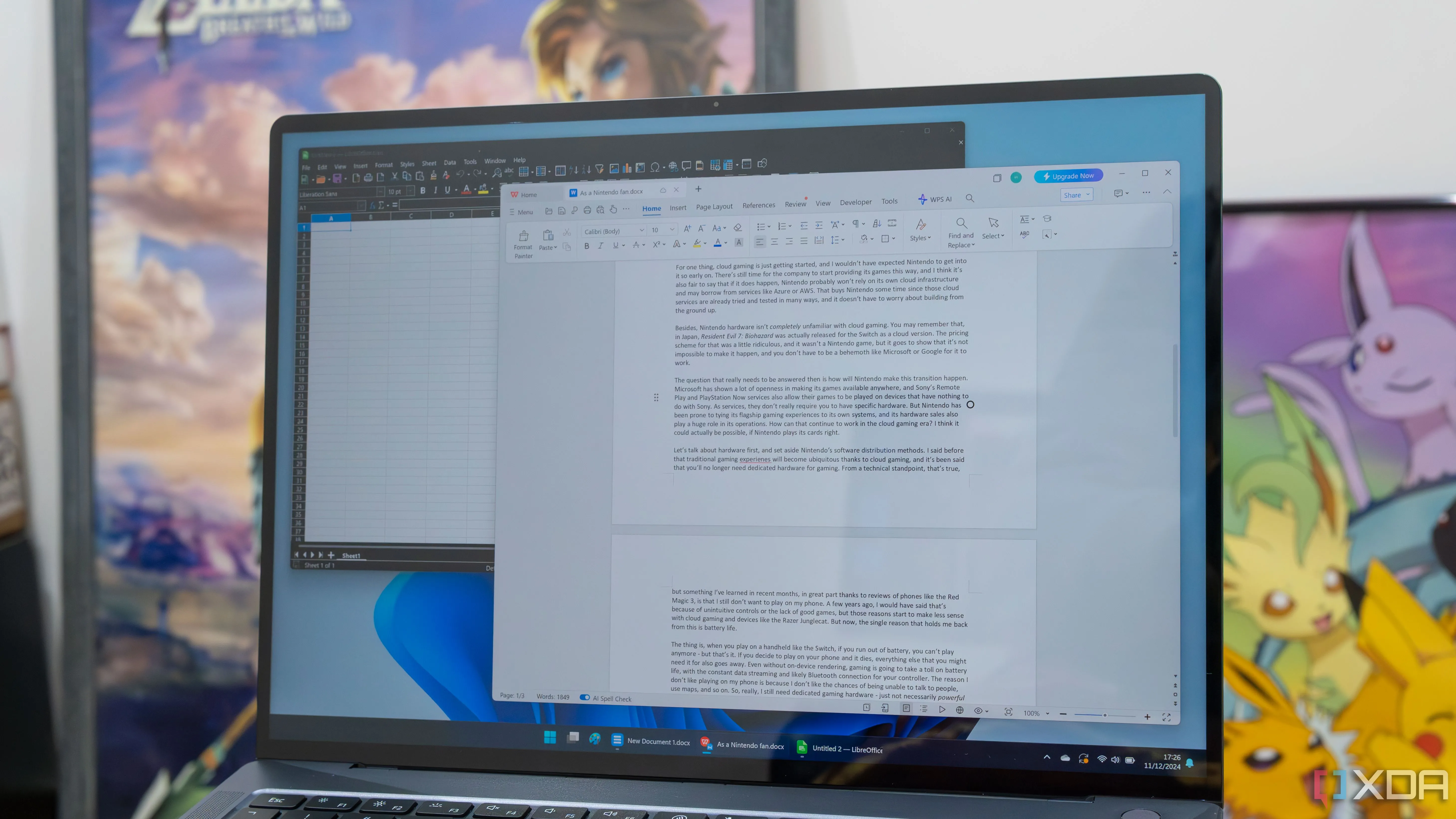 Laptop chạy Windows 11 với các ứng dụng văn phòng WPS Office và LibreOffice Calc