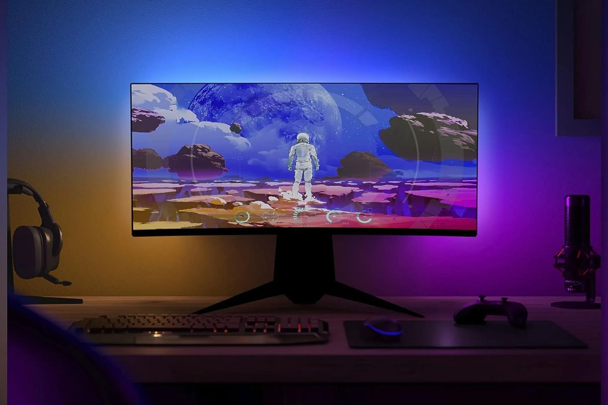 Màn hình chơi game có dải đèn LED Philips Hue Play Gradient phía sau, tạo hiệu ứng ánh sáng đồng bộ với nội dung hiển thị trên màn hình
