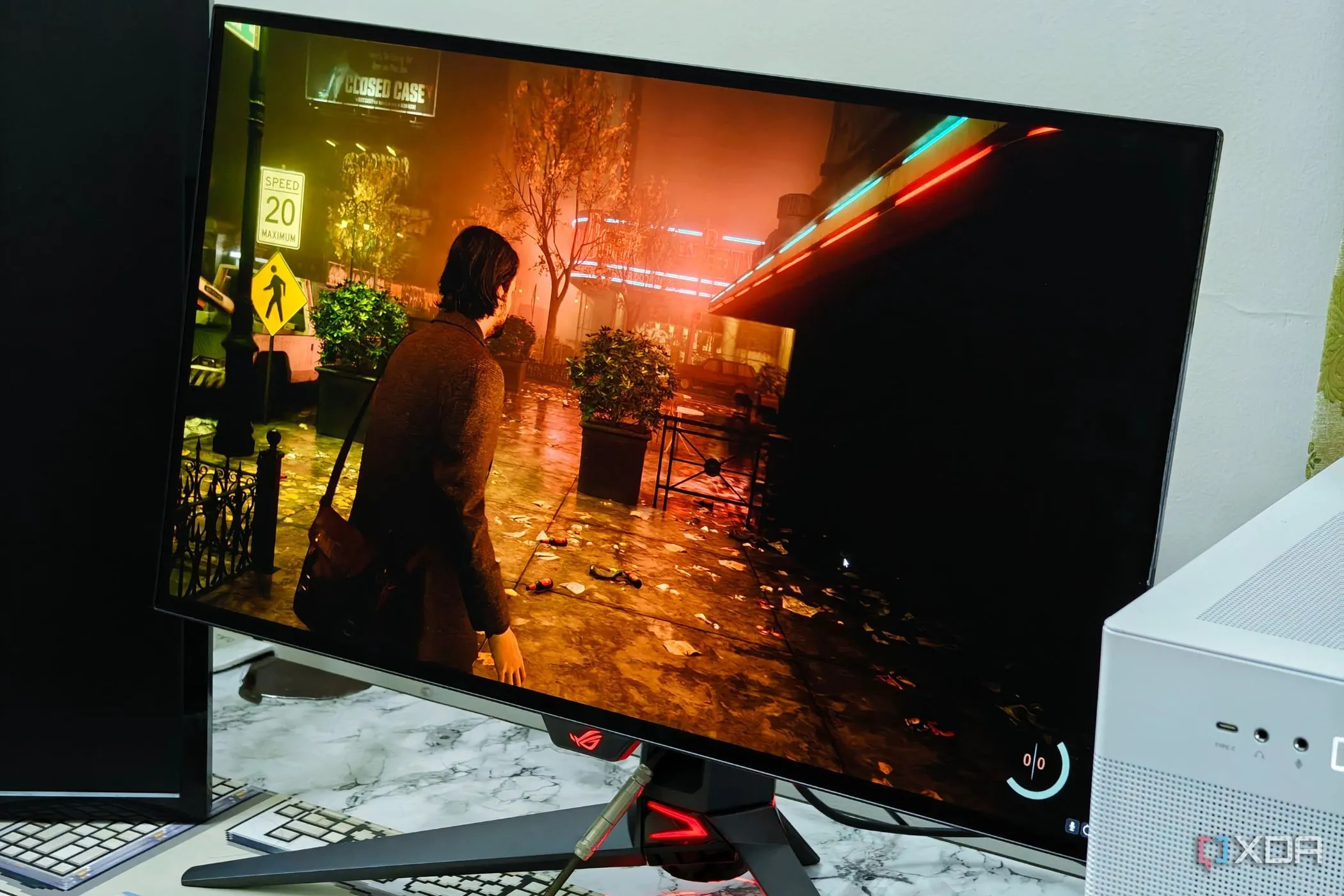 Màn hình gaming Asus ROG mỏng nhẹ hiển thị cảnh game Alan Wake 2