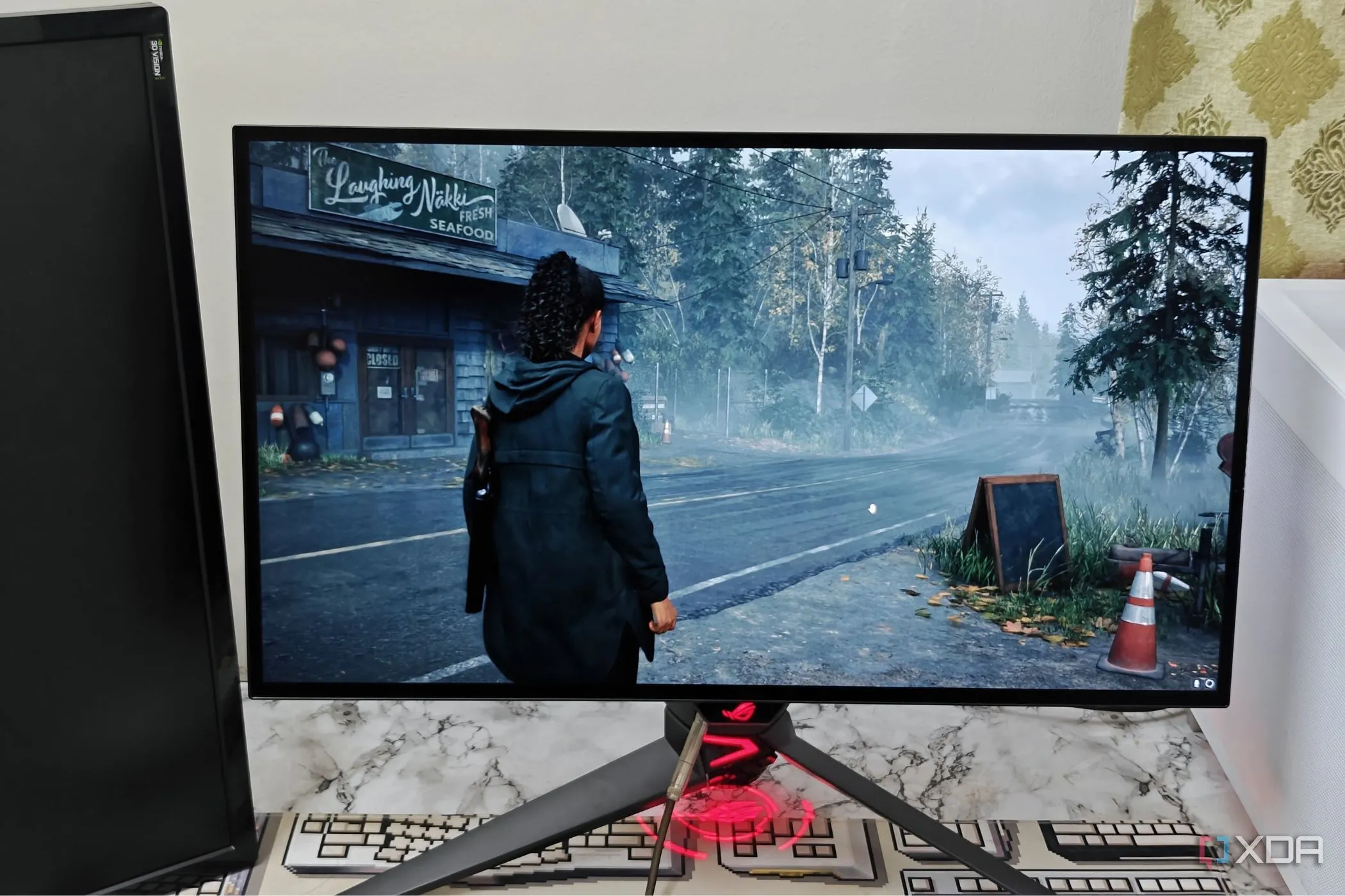 Màn hình gaming Asus ROG PG27AQDM hiển thị đồ họa chân thực của tựa game Alan Wake 2, minh chứng sức mạnh PC gaming