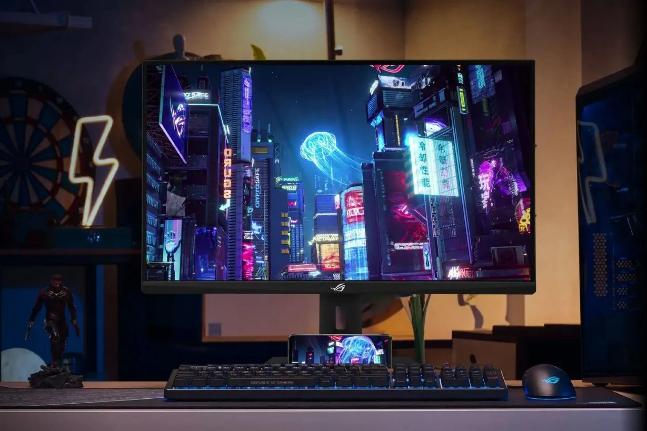 Màn hình gaming ASUS ROG Strix XG27UCG IPS với các thiết bị ngoại vi trên bàn, tối ưu cho Counter-Strike 2