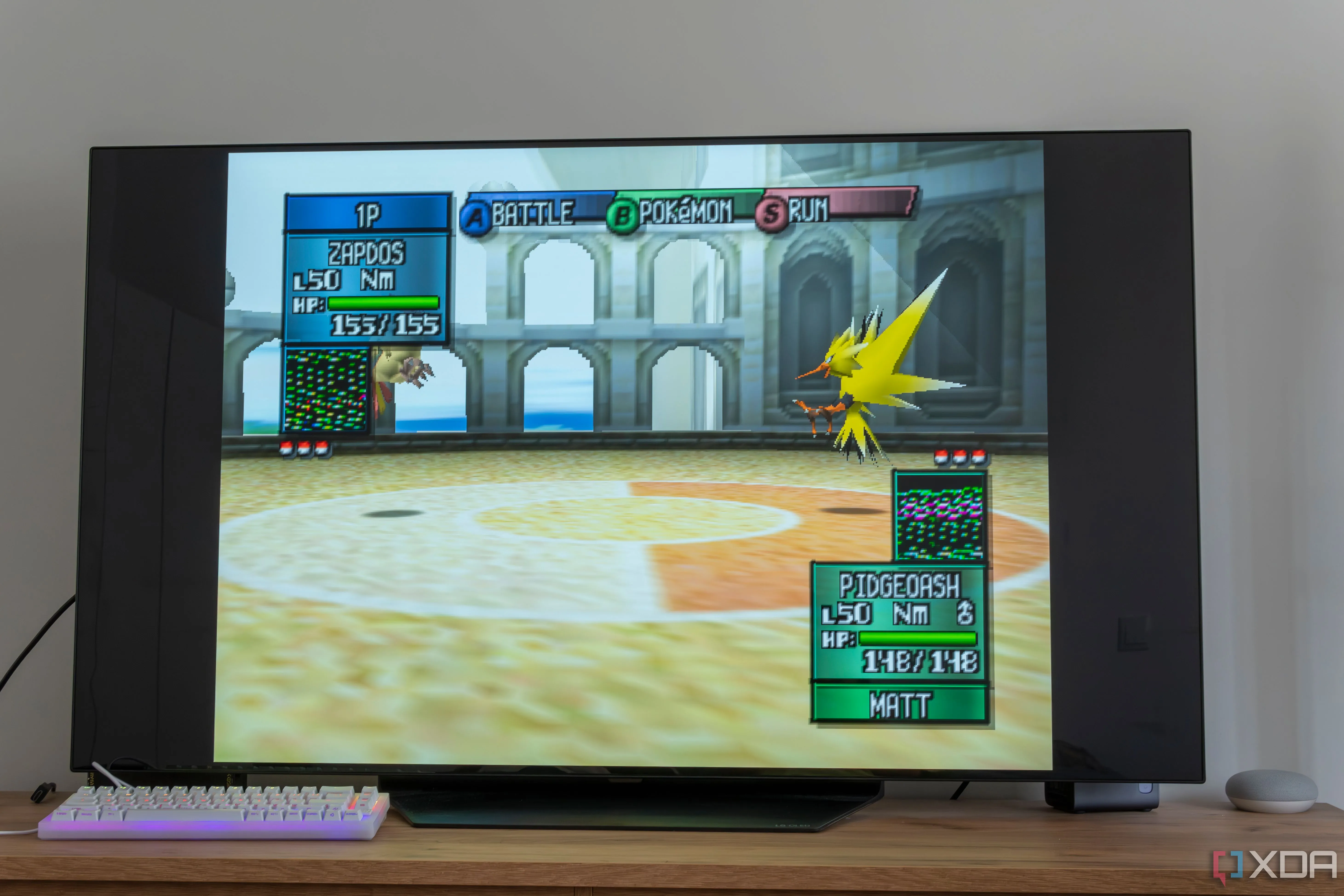 Màn hình TV hiển thị game Pokémon Stadium 2 chạy trên giả lập RetroArch qua EmulationStation