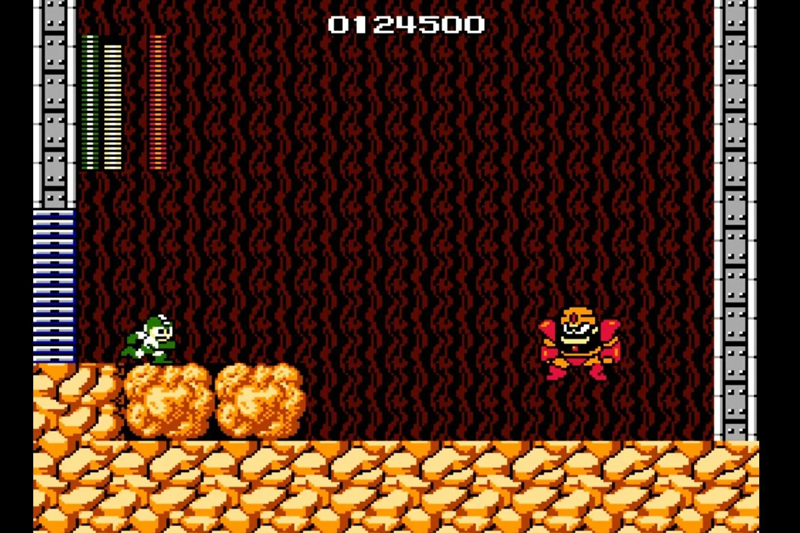Mega Man đối đầu với một boss trong phiên bản NES, nổi tiếng với thiết kế màn chơi và độ khó trừng phạt