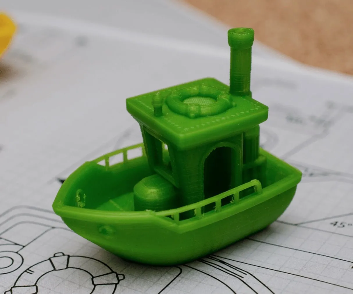 Mô hình 3DBenchy màu xanh, thường dùng để kiểm tra chất lượng máy in 3D