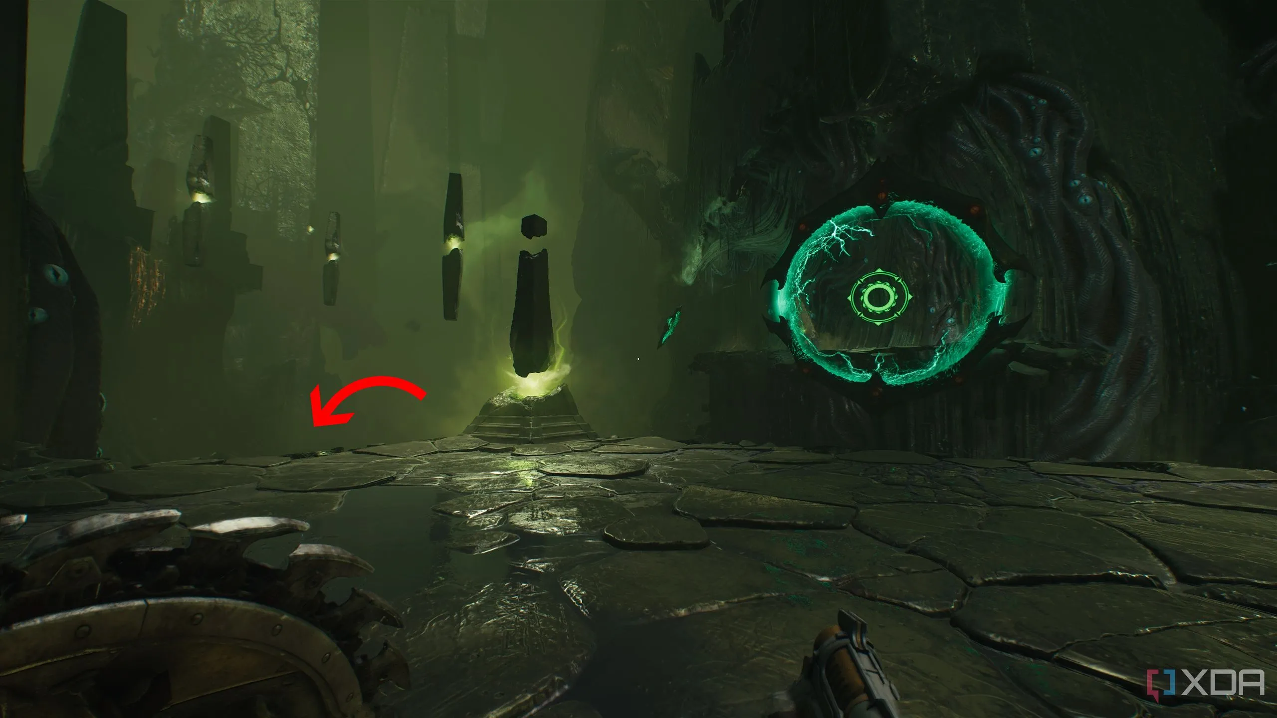 Mũi tên chỉ xuống bên trái cạnh một shield portal trong Chapter 15 của Doom: The Dark Ages.
