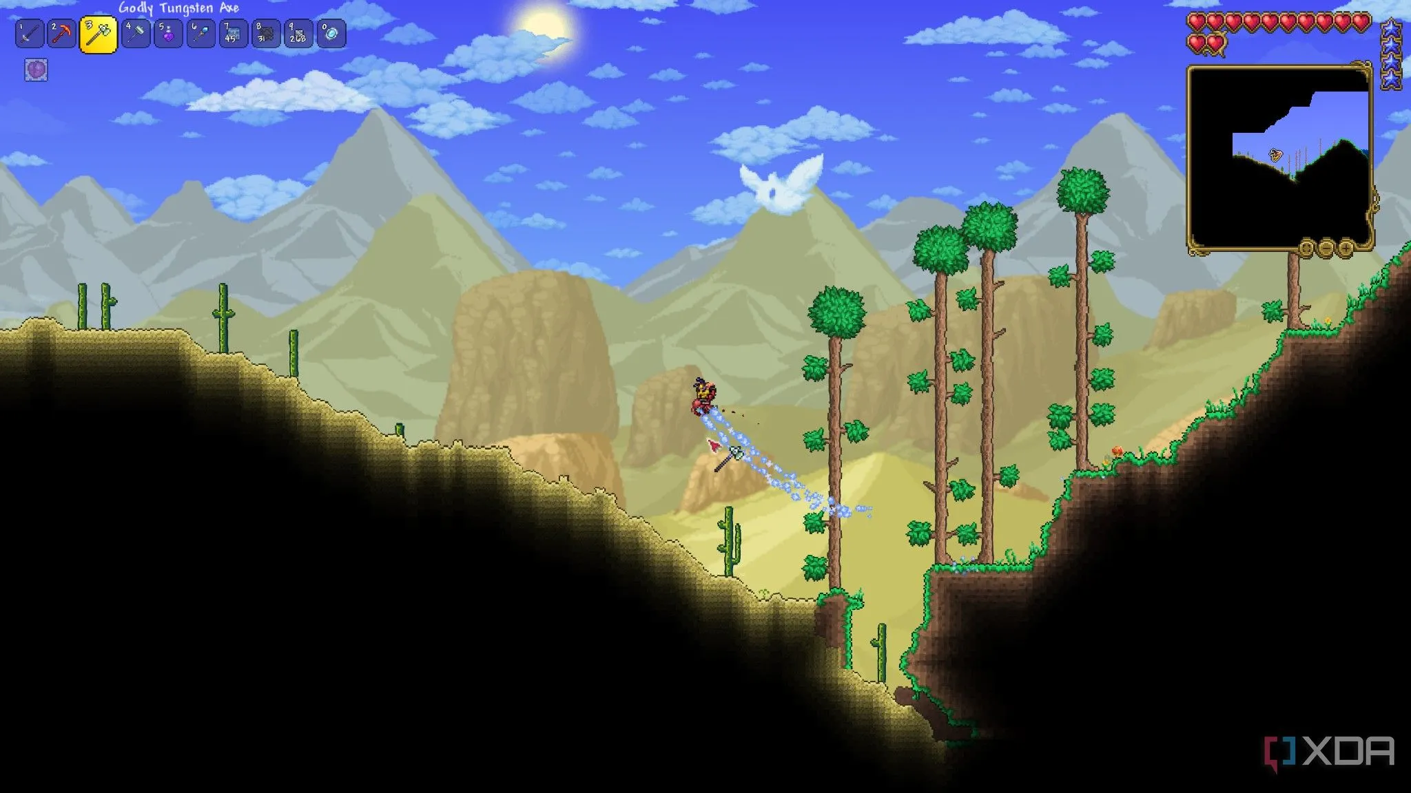 Người chơi khám phá quần xã sa mạc với đồ họa pixel đặc trưng trong game sinh tồn Terraria.