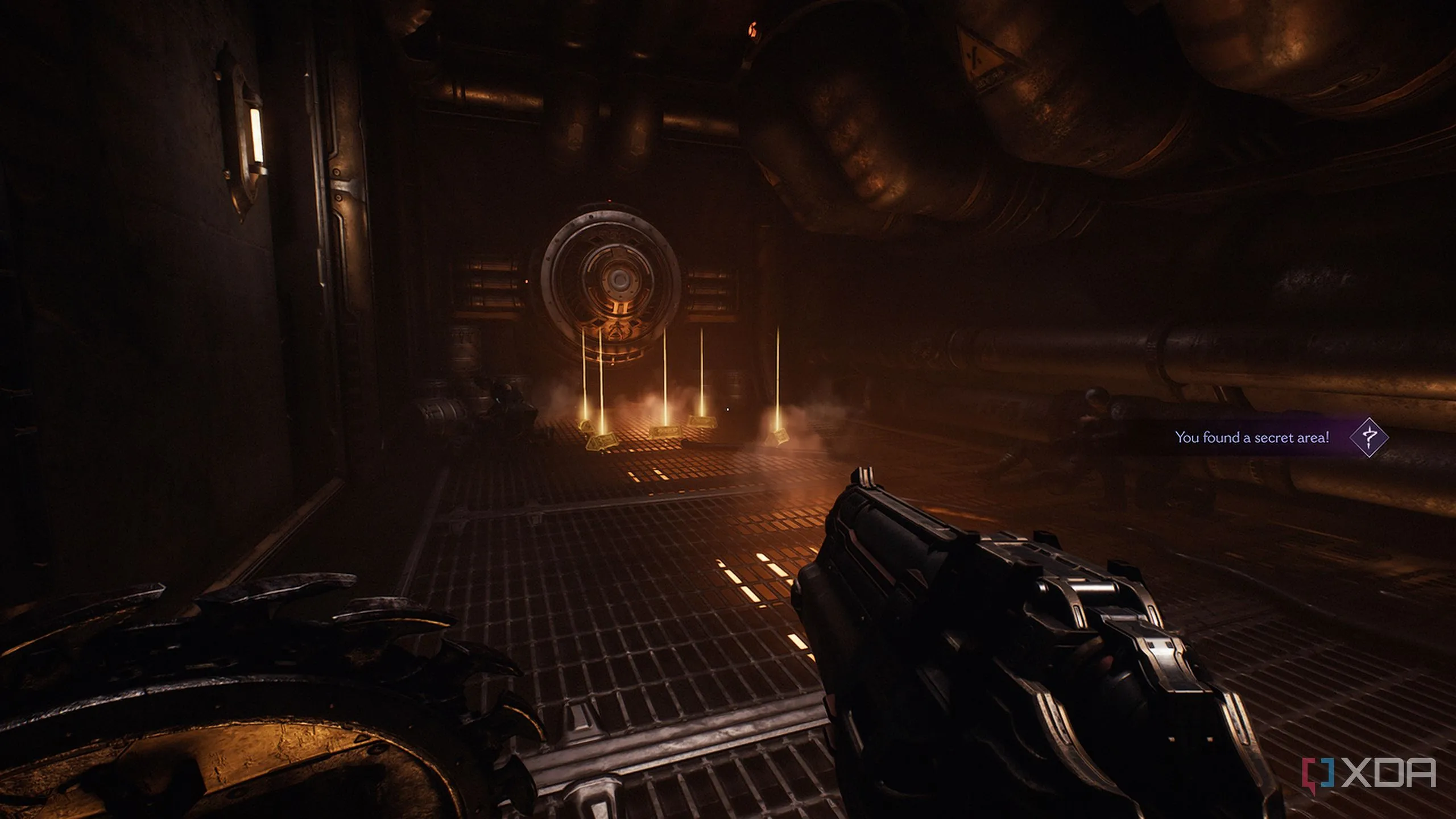 Nhiều cọc vàng trên mặt đất trong khu vực chứa Blue Keycard ở Doom: The Dark Ages