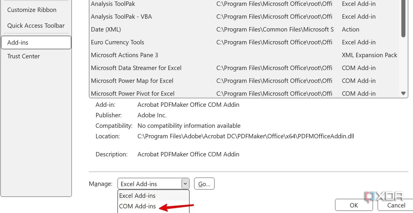 Truy cập menu Add-ins và chọn COM Add-ins trong Excel